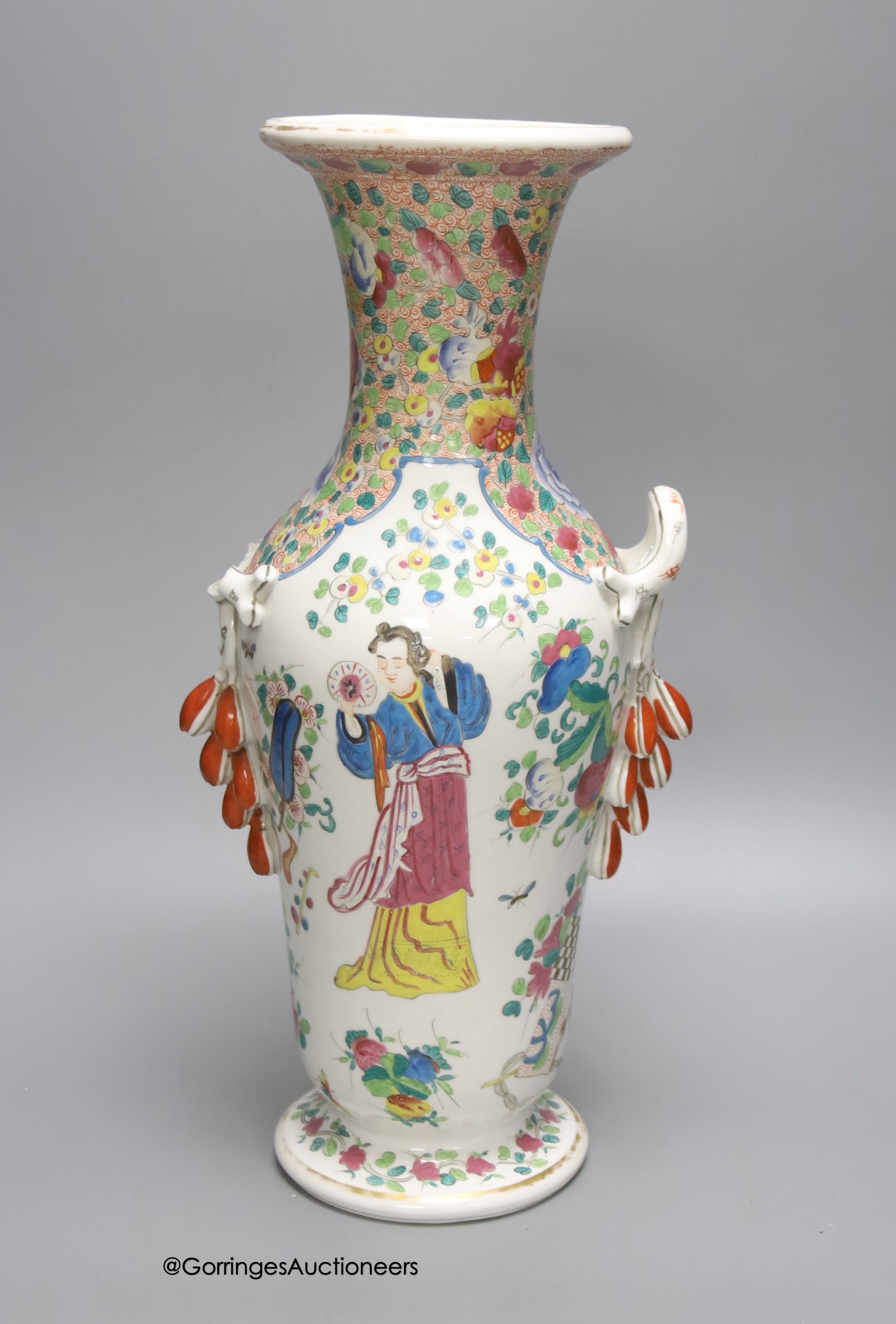 A 19th century French porcelain vase, enamelled in Chinese famille rose style, 38cm